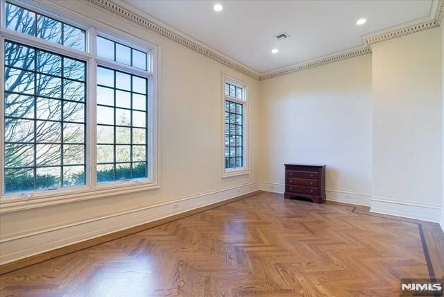 11 Margo Way, Alpine, NJ 07620 - unfurnished room featuring ornamental molding and recessed lighting