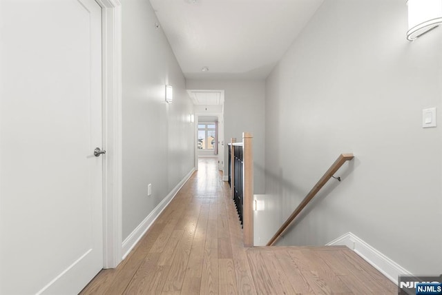 805 Fairview Ln, Fort Lee, NJ 07024 - hallway with an upstairs landing, attic access, light wood finished floors, and baseboards