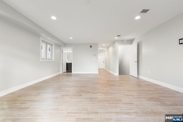 805 Fairview Ln, Fort Lee, NJ 07024 - unfurnished living room featuring recessed lighting, light wood finished floors, and baseboards