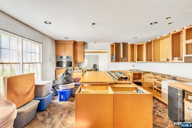 72 Francisco Ave, Little Falls, NJ 07424 - kitchen with oven, a center island, recessed lighting, and light countertops