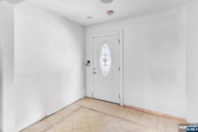 72 Francisco Ave, Little Falls, NJ 07424 - foyer with light tile patterned flooring