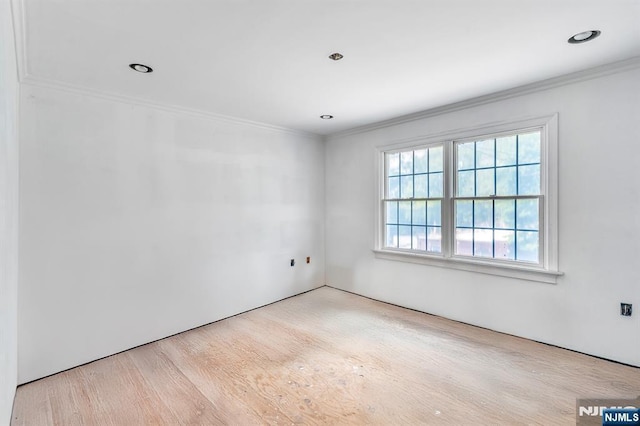 72 Francisco Ave, Little Falls, NJ 07424 - empty room with crown molding, wood finished floors, and recessed lighting
