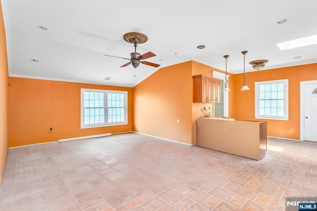 72 Francisco Ave, Little Falls, NJ 07424 - unfurnished living room featuring a skylight, ceiling fan, baseboards, ornamental molding, and baseboard heating