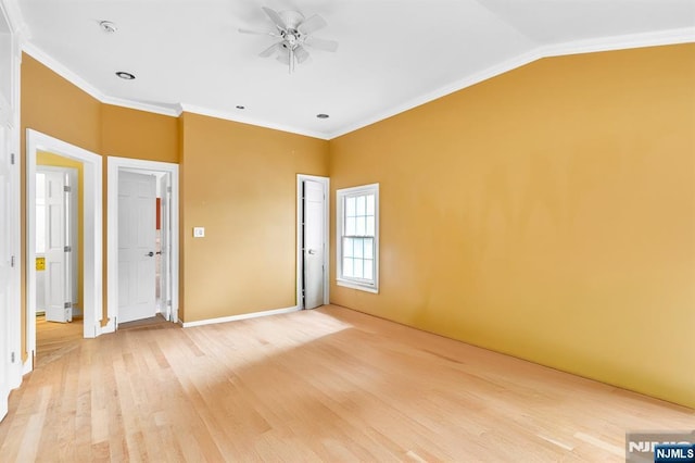 72 Francisco Ave, Little Falls, NJ 07424 - unfurnished bedroom with light wood-style floors, ornamental molding, baseboards, and vaulted ceiling