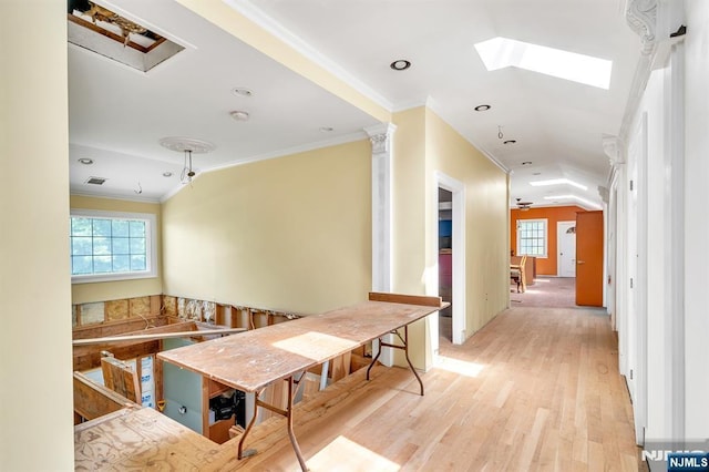 72 Francisco Ave, Little Falls, NJ 07424 - corridor with plenty of natural light, light wood-style floors, crown molding, a skylight, and recessed lighting
