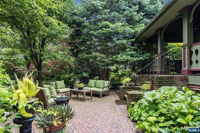 33 Ramapo Ave, Pompton Lakes, NJ 07442 - view of patio / terrace with an outdoor living space and stairs