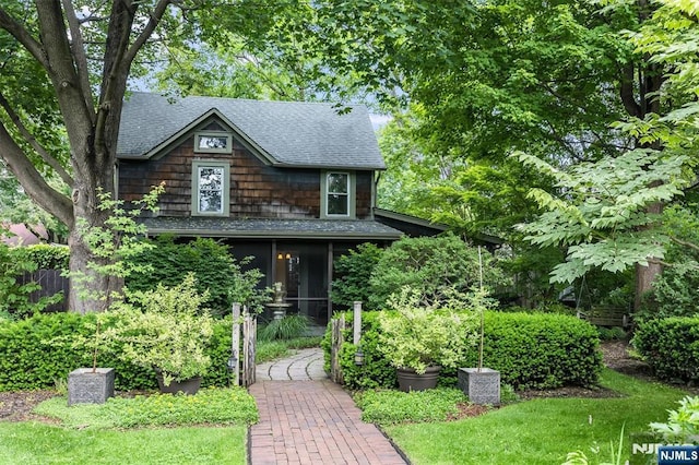 33 Ramapo Ave, Pompton Lakes, NJ 07442 - view of front facade with a shingled roof