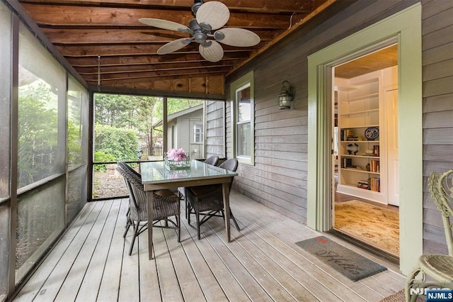33 Ramapo Ave, Pompton Lakes, NJ 07442 - sunroom featuring ceiling fan, beamed ceiling, and outdoor dining space