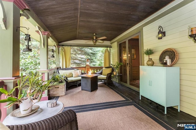 33 Ramapo Ave, Pompton Lakes, NJ 07442 - sunroom featuring an outdoor fire pit, wooden ceiling, ceiling fan, wood walls, and french doors