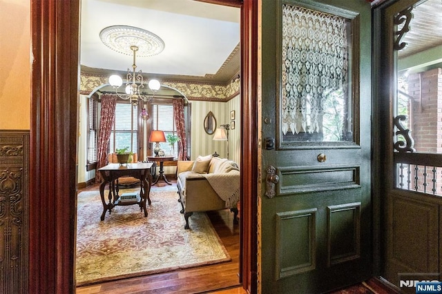 33 Ramapo Ave, Pompton Lakes, NJ 07442 - foyer entrance with wood finished floors and a chandelier