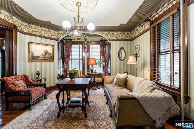 33 Ramapo Ave, Pompton Lakes, NJ 07442 - sitting room with wallpapered walls, wood finished floors, a chandelier, ornamental molding, and baseboards