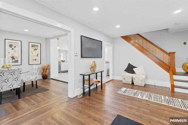 1146 Stasia St, Teaneck, NJ 07666 - living area featuring stairs, wood finished floors, and recessed lighting