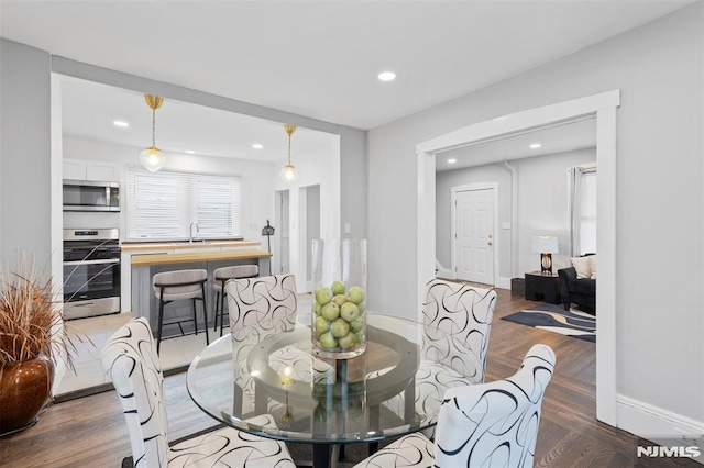 1146 Stasia St, Teaneck, NJ 07666 - dining area featuring recessed lighting and wood finished floors