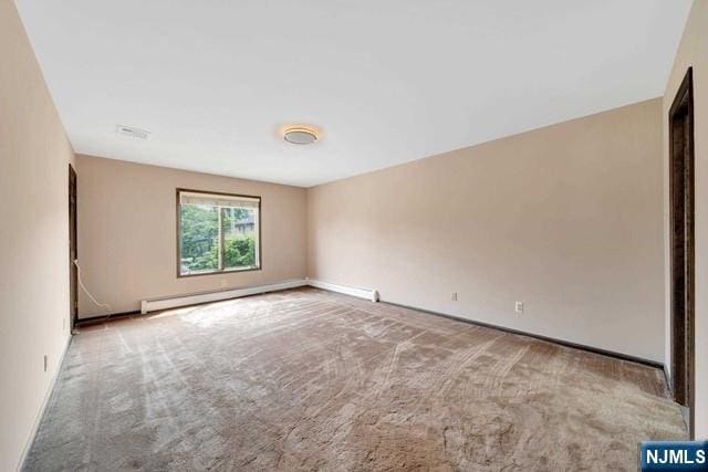 23 Bohnert Pl, Waldwick, NJ 07463 - spare room featuring carpet floors and baseboards