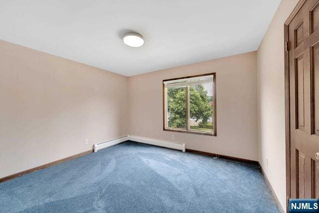 23 Bohnert Pl, Waldwick, NJ 07463 - empty room featuring baseboard heating, carpet floors, and baseboards