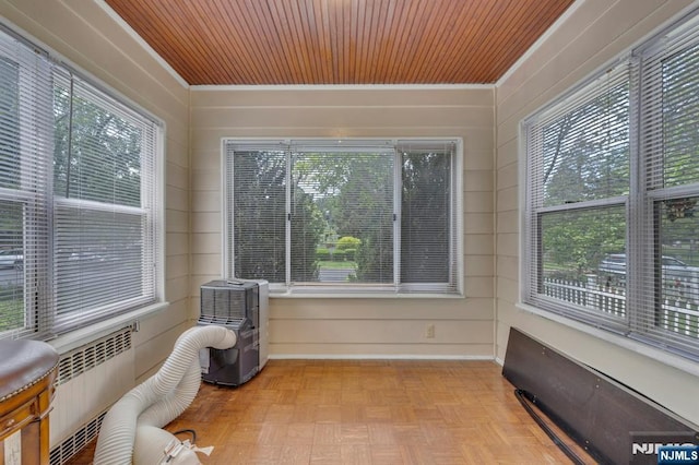 179 State St, Bloomfield, NJ 07003 - sunroom / solarium with radiator, healthy amount of natural light, and wood ceiling