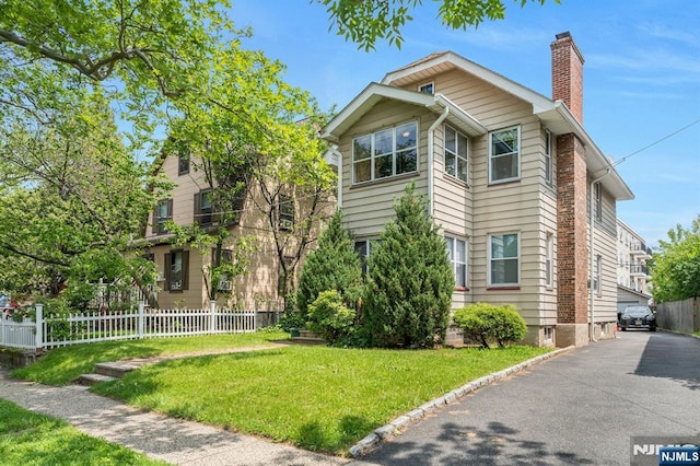 179 State St, Bloomfield, NJ 07003 - view of side of home with a chimney