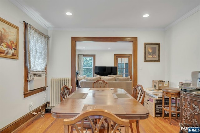 179 State St, Bloomfield, NJ 07003 - dining space featuring radiator heating unit, light wood-type flooring, ornamental molding, recessed lighting, and baseboards