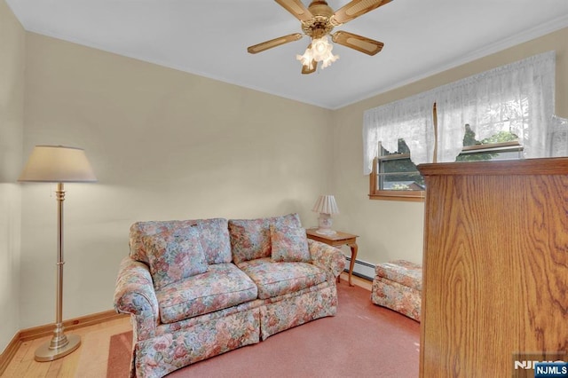 13 Wonham St, Clifton, NJ 07013 - carpeted living room with a ceiling fan, crown molding, and baseboard heating