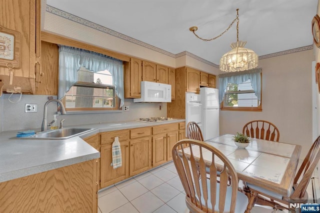 13 Wonham St, Clifton, NJ 07013 - kitchen featuring white appliances, a sink, healthy amount of natural light, and a chandelier