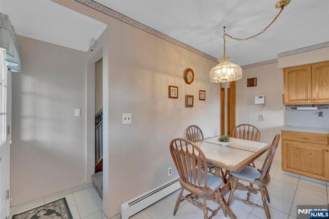 13 Wonham St, Clifton, NJ 07013 - dining space with baseboard heating, a chandelier, light tile patterned flooring, and wallpapered walls