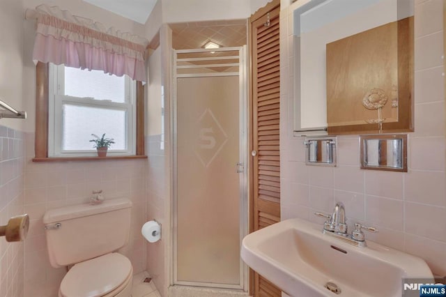 13 Wonham St, Clifton, NJ 07013 - full bath with tile walls, a sink, a shower stall, and toilet