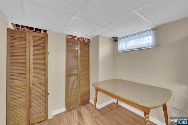13 Wonham St, Clifton, NJ 07013 - below grade area featuring baseboards, wood finished floors, and a paneled ceiling