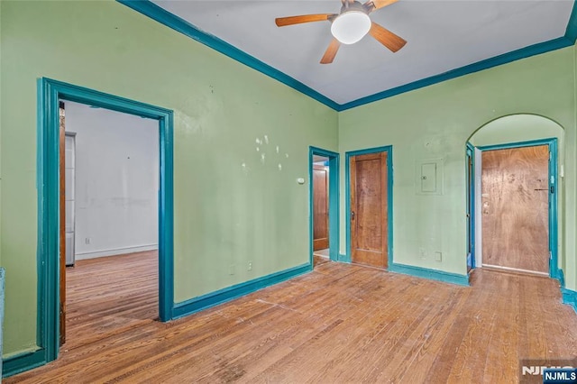 300 2nd St Unit 2, Jersey City, NJ 07302 - spare room with wood finished floors, a ceiling fan, baseboards, crown molding, and electric panel