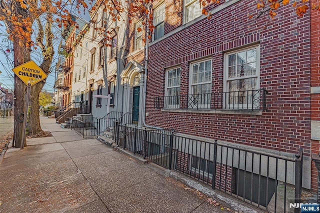 300 2nd St Unit 2, Jersey City, NJ 07302 - view of side of property with brick siding