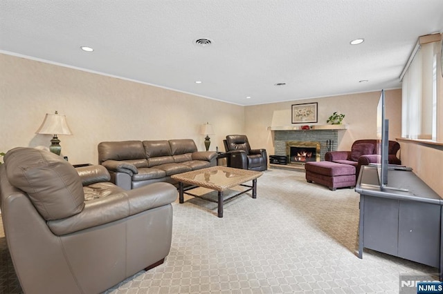 13 Stonewall Dr, Livingston, NJ 07039 - living area with light carpet, a stone fireplace, recessed lighting, crown molding, and a textured ceiling