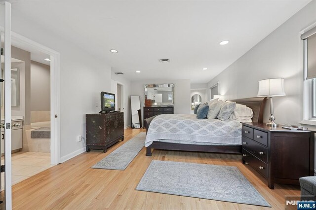 13 Stonewall Dr, Livingston, NJ 07039 - bedroom featuring light wood-style flooring and recessed lighting