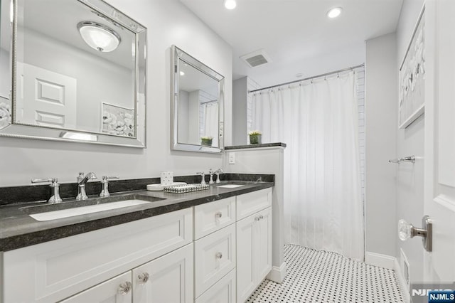 13 Stonewall Dr, Livingston, NJ 07039 - bathroom with double vanity, a shower with curtain, tile patterned floors, recessed lighting, and baseboards