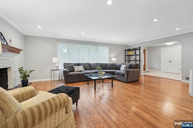 13 Stonewall Dr, Livingston, NJ 07039 - living area with arched walkways, recessed lighting, light wood-style floors, baseboards, and ornamental molding