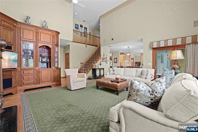 12 Woodland Ct, Wayne, NJ 07470 - living room featuring a high ceiling, stairs, wood finished floors, and a ceiling fan