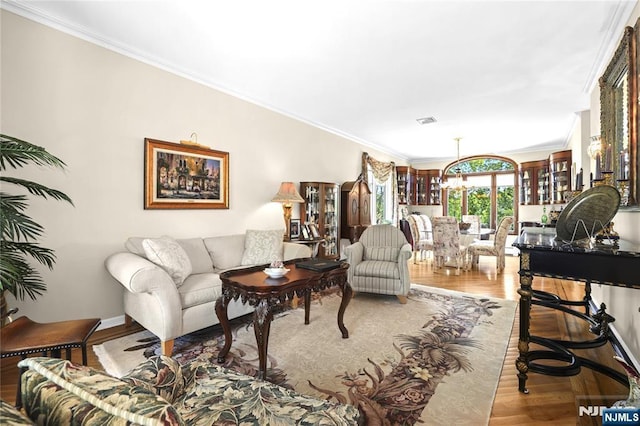 12 Woodland Ct, Wayne, NJ 07470 - living area featuring ornamental molding and light wood-type flooring