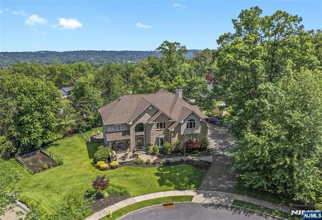 12 Woodland Ct, Wayne, NJ 07470 - view from above of property featuring a heavily wooded area