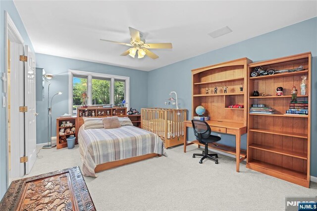 12 Woodland Ct, Wayne, NJ 07470 - carpeted bedroom with a desk and a ceiling fan