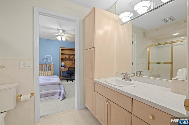 12 Woodland Ct, Wayne, NJ 07470 - full bathroom with toilet, tile patterned flooring, ensuite bathroom, vanity, and a shower with door