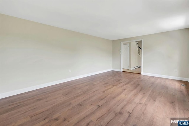 1582 Grnwd Lk, West Milford, NJ 07421 - empty room featuring baseboards and wood finished floors
