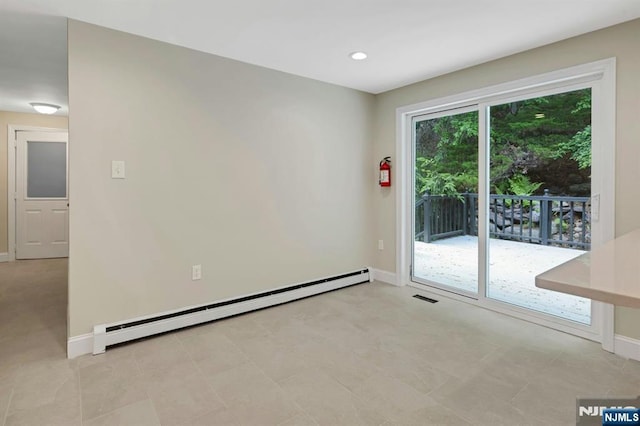 1582 Grnwd Lk, West Milford, NJ 07421 - empty room with a baseboard heating unit, baseboards, and recessed lighting
