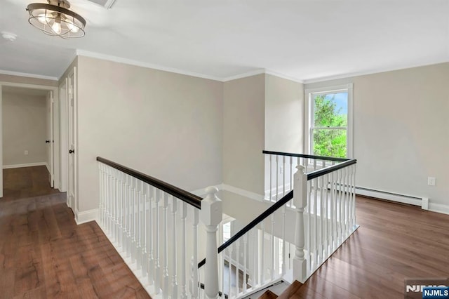 1582 Grnwd Lk, West Milford, NJ 07421 - hallway with an upstairs landing, wood finished floors, a baseboard radiator, crown molding, and baseboards