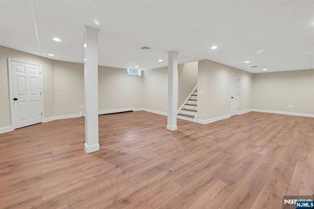 1582 Grnwd Lk, West Milford, NJ 07421 - finished basement featuring light wood-type flooring, stairway, baseboards, baseboard heating, and recessed lighting