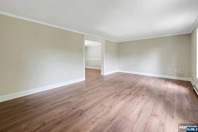 1582 Grnwd Lk, West Milford, NJ 07421 - unfurnished room featuring ornamental molding, wood finished floors, and baseboards