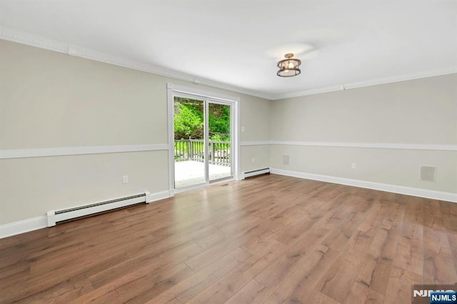 1582 Grnwd Lk, West Milford, NJ 07421 - unfurnished room featuring a baseboard heating unit, ornamental molding, wood finished floors, and baseboards