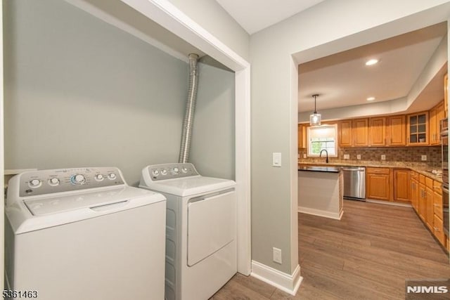 5 Britton St, Netcong Borough, NJ 07857 - washroom with separate washer and dryer, light wood-style flooring, baseboards, and recessed lighting