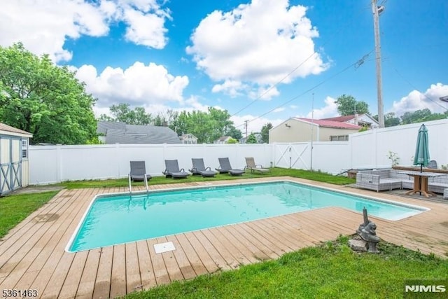 5 Britton St, Netcong Borough, NJ 07857 - view of swimming pool featuring a wooden deck and a fenced backyard