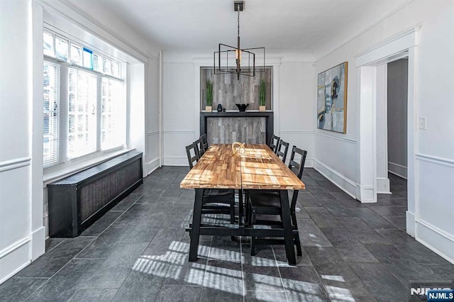 10 Whittier Ave, Trenton, NJ 08618 - dining area with radiator and a chandelier