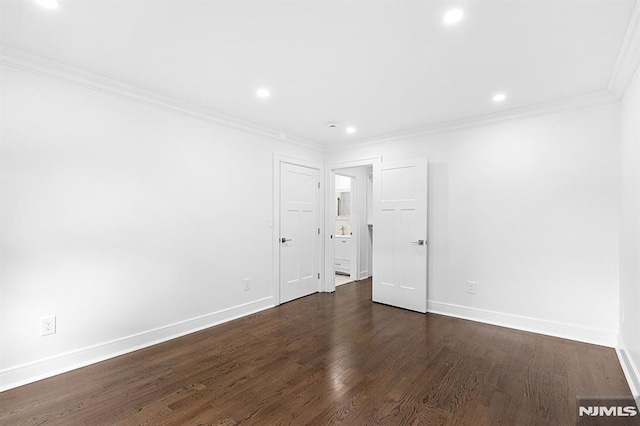 309 Clinton Ave, Bergenfield, NJ 07621 - unfurnished room featuring crown molding, dark wood-type flooring, and recessed lighting