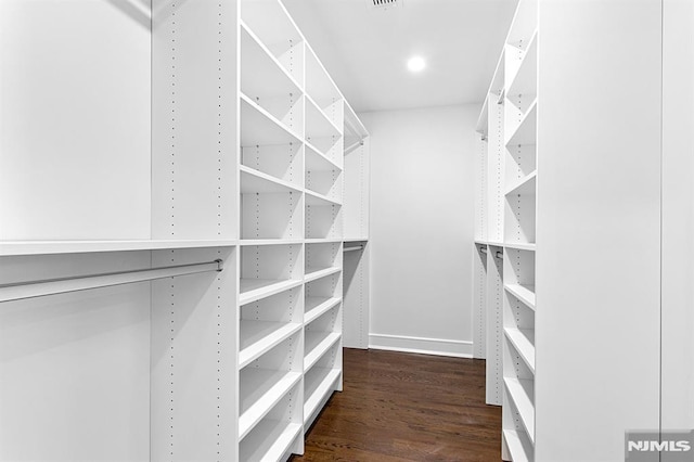 309 Clinton Ave, Bergenfield, NJ 07621 - spacious closet featuring dark wood finished floors