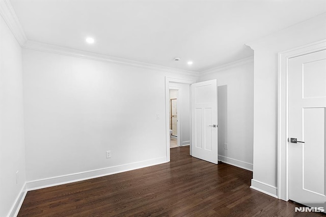 309 Clinton Ave, Bergenfield, NJ 07621 - unfurnished bedroom featuring dark wood-type flooring, crown molding, and recessed lighting